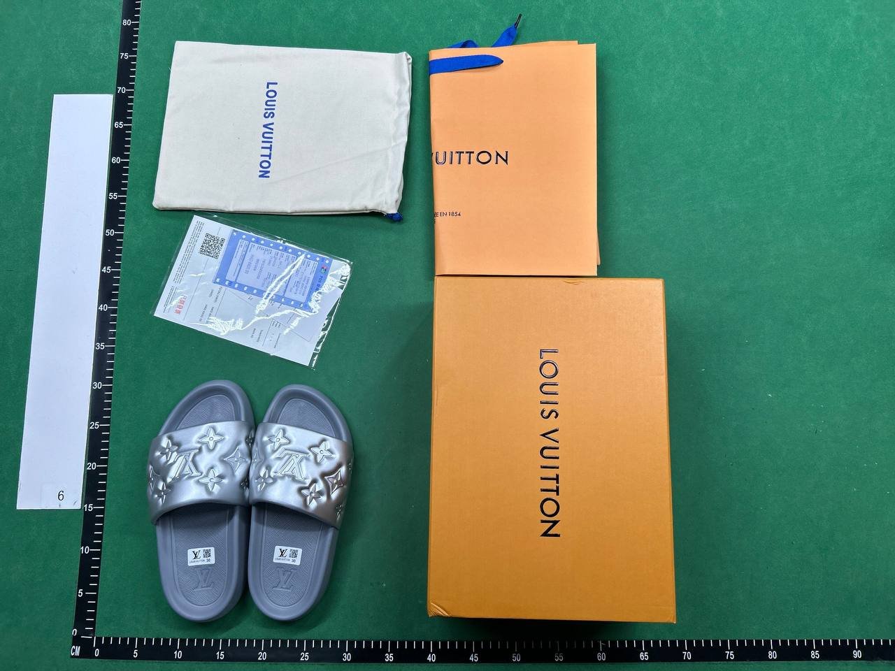LOUIS VUITTON SLIDES