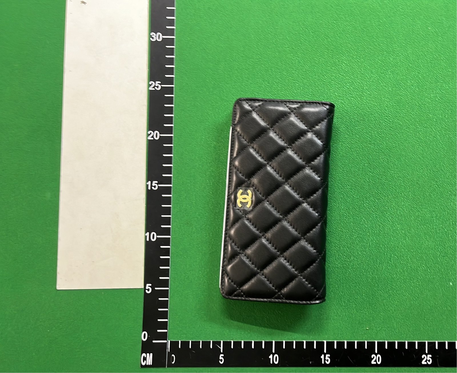 Classic Black Leather Wallet with Heart Clasp by Chanel